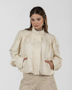 Refined Off-White Silk Jacquard Turtleneck Top