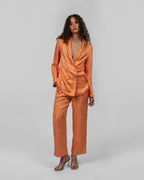Set of loose-fit wrapped blazer and trousers.