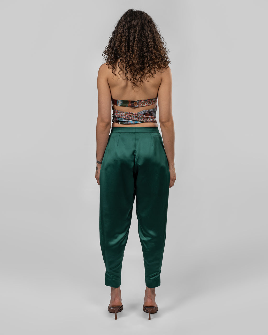 Luxurious emerald green silk satin trousers