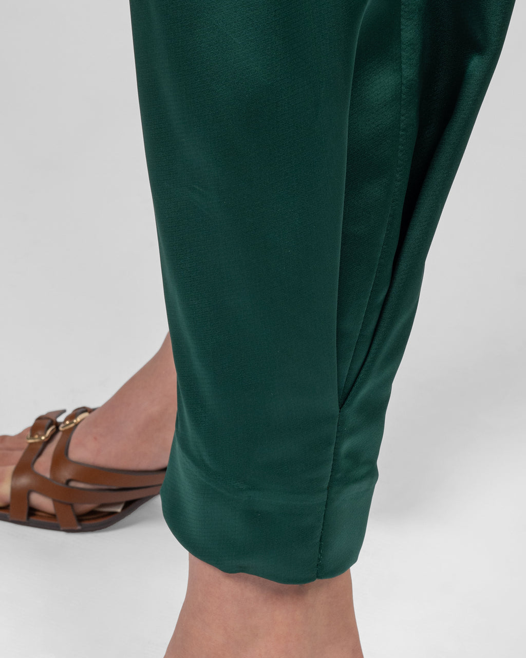 Luxurious emerald green silk satin trousers