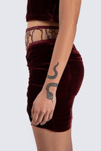 Burgundy skirt with details